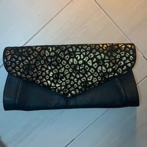 See by Chloe cheeta print clutch